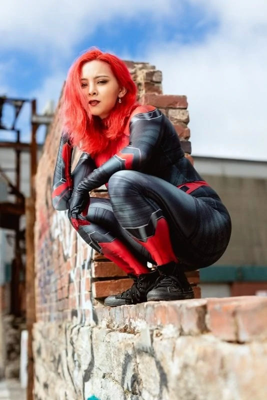atlanta spiderwpman cosplay sitting on brick wall krog street market