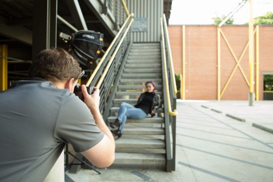 picture of atlanta photographer taking portrait of female model on Atlanta steps