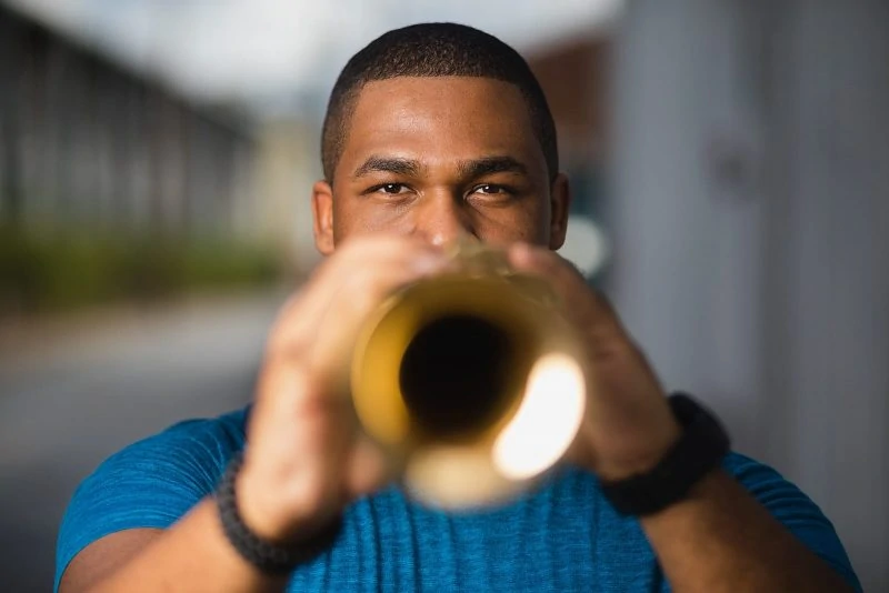 jazz musician plays saxophone in east midtown atlanta brand photographer