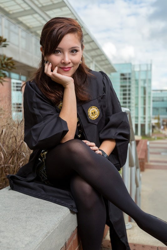 college senior graduation flash portrait with gown