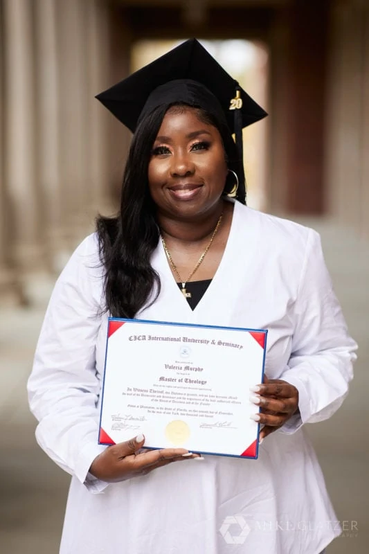 black masters graduation student